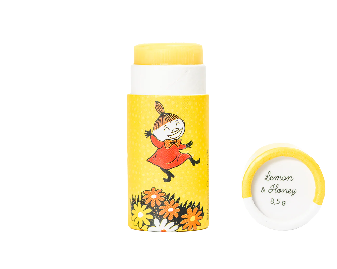 The Gustaf & Linnea Moomin Lipbalm Little My features a girl in red amid flowers on a yellow tube. With Lemon & Honey, 8.5g, this eco-friendly lip balm keeps lips soft and nourished.