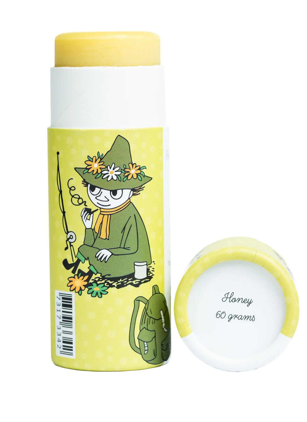 A yellow 60g tube of Gustaf & Linnea Snufkins Solid Foot Lotion features a character with a green hat and daisy crown, fishing and sipping tea by a backpack. The eco-friendly package has the cap next to the tube.