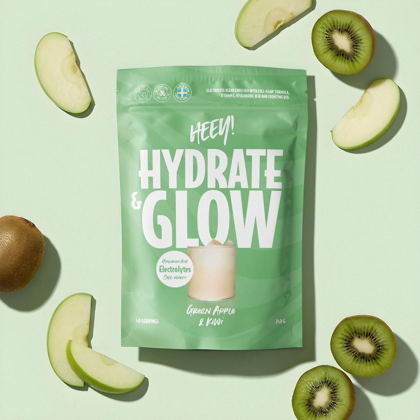 Green 'Hydrate & Glow' package with green apple and kiwi slices on a light green background