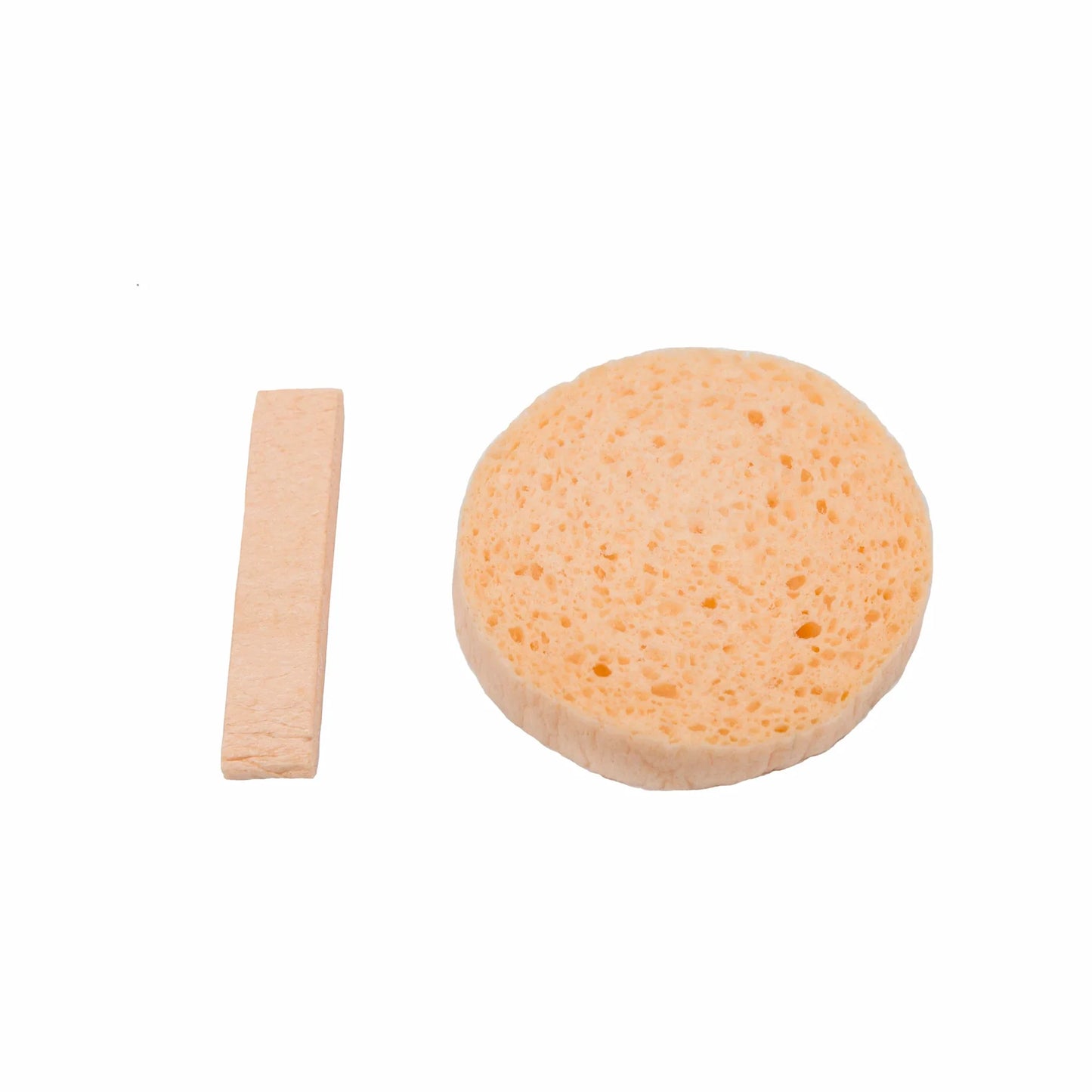 Two objects on a white background: a rectangular beige stick and a round spongy disc with foamy textures. The Luonkos Glow & Shine Skincare Set by Luonkos is ideal for daily use or as part of a vegan skincare routine inspired by Finnish tradition.