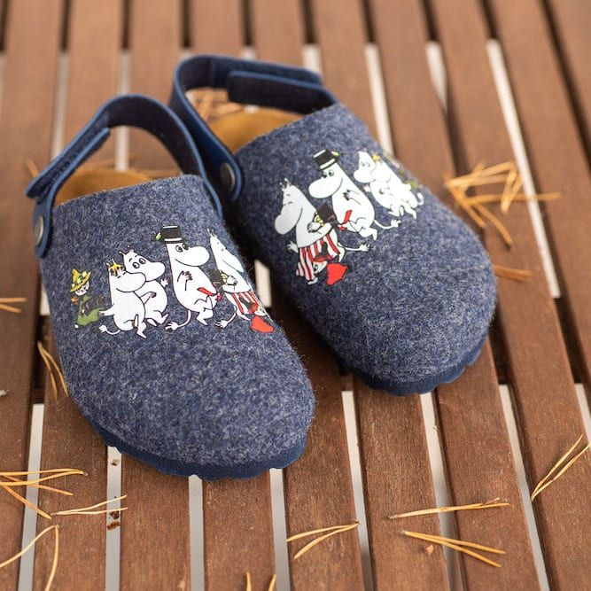 The Moomin Kids Felt Slippers Blue by Zapatillas feature playful cartoon prints, offering charming and cozy sustainable footwear for kidsâperfect for little feet.