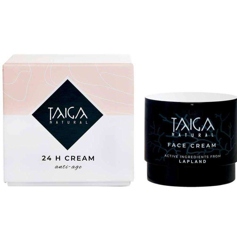 A white box and black jar of Taiga Cosmetics 24 H Cream Anti-Age, with minimalist design, labeled with Active Ingredients from Lapland—an anti-ageing, firming cream by Taiga Cosmetics ideal for dry skin.