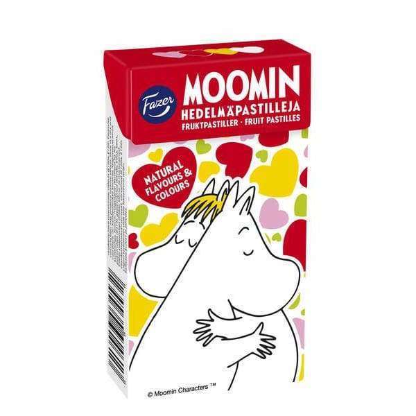 Fazer Moomin Fruit Pastilles by Fazer come in a box with two white Moomin characters hugging on a heart-filled colorful background. This vegan candy is made with delicious natural flavors.