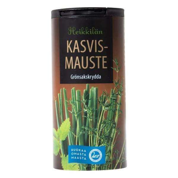 A cylindrical container of Heikkilä's Vegetable Seasoning by Heikkilä's, decorated with images of fresh herbs and labeled in Finnish and Swedish.