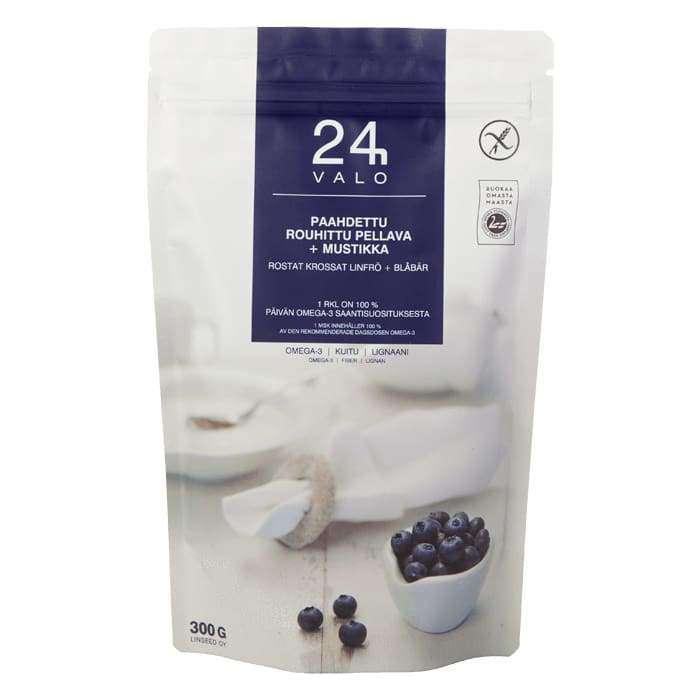 The 300g Valo24h Roasted Ground Flaxseed + Wild Blueberry comes in a white and purple resealable bag with Finnish and Swedish text, nutrition icons, and an image of blueberries in a bowl. The packaging highlights omega-3 content.