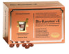 A box of Pharma Nord Bio-Carotene + E capsules, with betacarotene for vision support. The orange pack shows Finnish and Swedish text, product info, and a window revealing brown gel capsules inside.