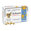 A box of Pharma Nord D-Pearls 38 mikrog is shown with small, round, yellow capsules in front. The packaging displays a sun design and text in Finnish and Swedish noting support for the immune system.