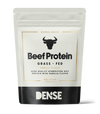 A white and black pouch labeled DENSE Beef Protein Vanilla features a bull head icon, 500g net weight, and highlights gut-friendly beef protein powder from the brand DENSE.