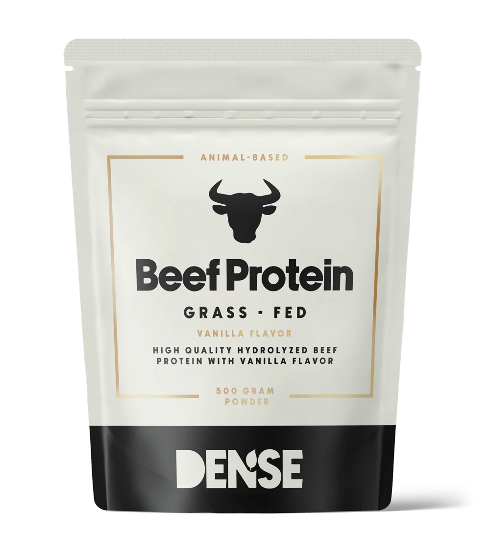 A white and black pouch labeled DENSE Beef Protein Vanilla features a bull head icon, 500g net weight, and highlights gut-friendly beef protein powder from the brand DENSE.