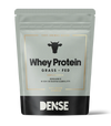 DENSE Organic Grass-Fed Whey Protein Unflavored comes in a gray and black resealable bag with a cow icon and gold border, containing 500g of high-bioavailability protein for clean nutrition.