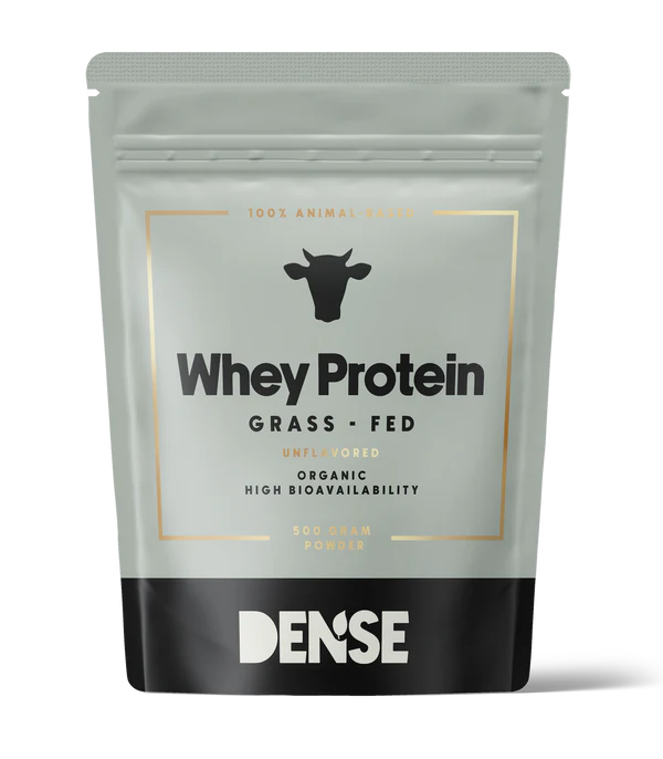 DENSE Organic Grass-Fed Whey Protein Unflavored comes in a gray and black resealable bag with a cow icon and gold border, containing 500g of high-bioavailability protein for clean nutrition.