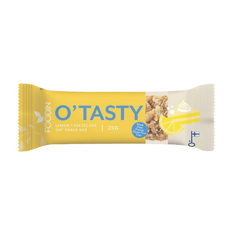 A yellow and white Foodin O’Tasty Oat Bar Lemon Cheesecake wrapper displays oat clusters, a lemon slice, and cheesecake cream swirl. The 25g gluten-free snack bar features bright lemon and cheesecake visuals.