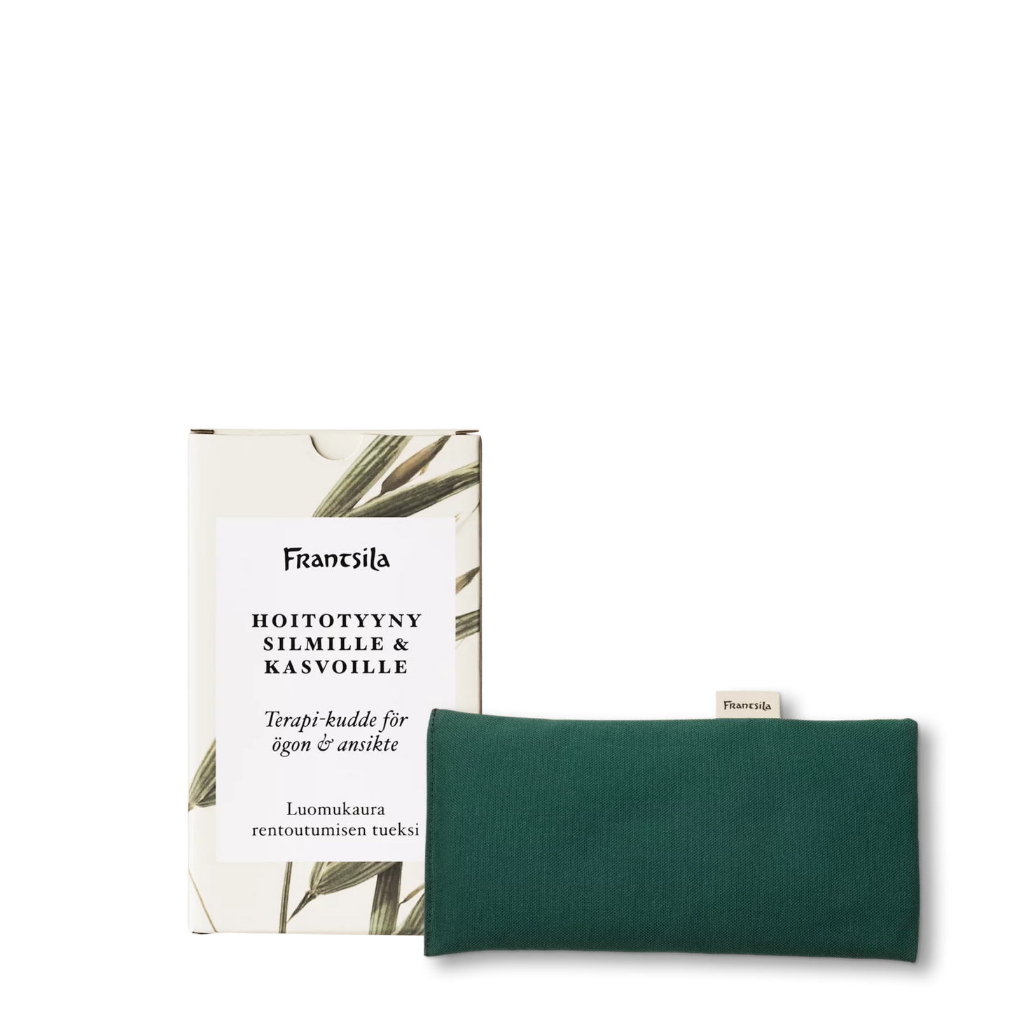 The Frantsila Care Pillow for Eyes and Face, a green therapeutic pillow made from GOTS-certified cotton, is shown in front of its box featuring botanical designs and Finnish-Swedish text, all set against a white background.