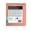 The back of a bath bomb package in a dusty rose color, featuring a black and white label with product name 'CALM & BALANCED', ingredients, directions, and a barcode.