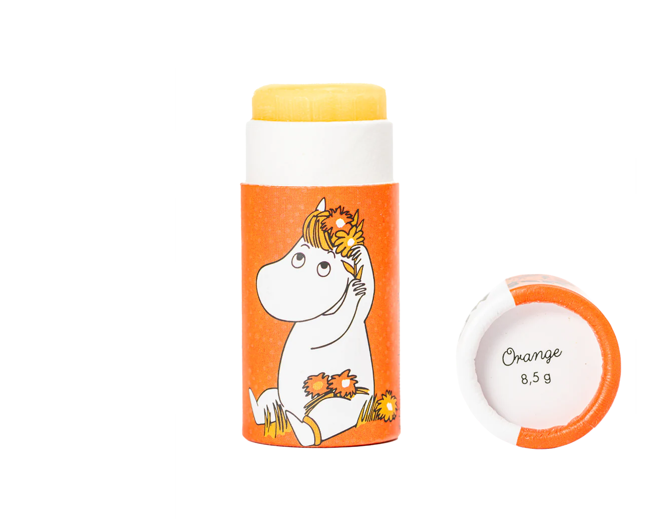 A Gustaf & Linnea Moomin Lipbalm Snork Maiden tube with a Moomin character and flowers stands by its cap labeled Orange 8.5g. The yellow, natural-ingredient balm is partially twisted up against a white background.