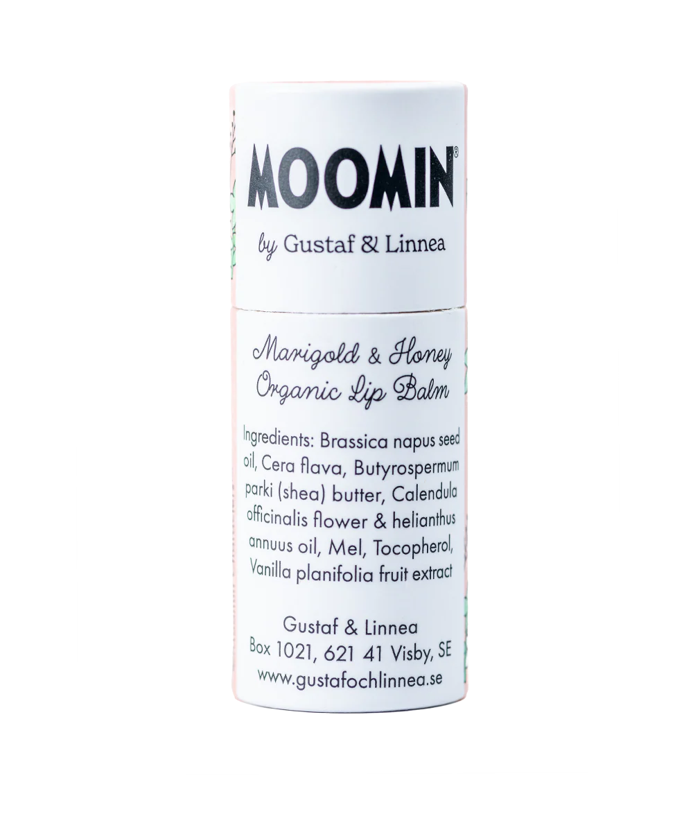 A white tube of Gustaf & Linnea Moomin Lipbalm Sniff features eco-friendly packaging and displays ingredients and contact info on the label in black and pastel pink text.