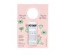 A tube of Gustaf & Linnea Moomin Lipbalm Sniff is shown on a pink card with flower designs and info, highlighting ethically harvested beeswax, handmade in Sweden, and plastic-free packaging.