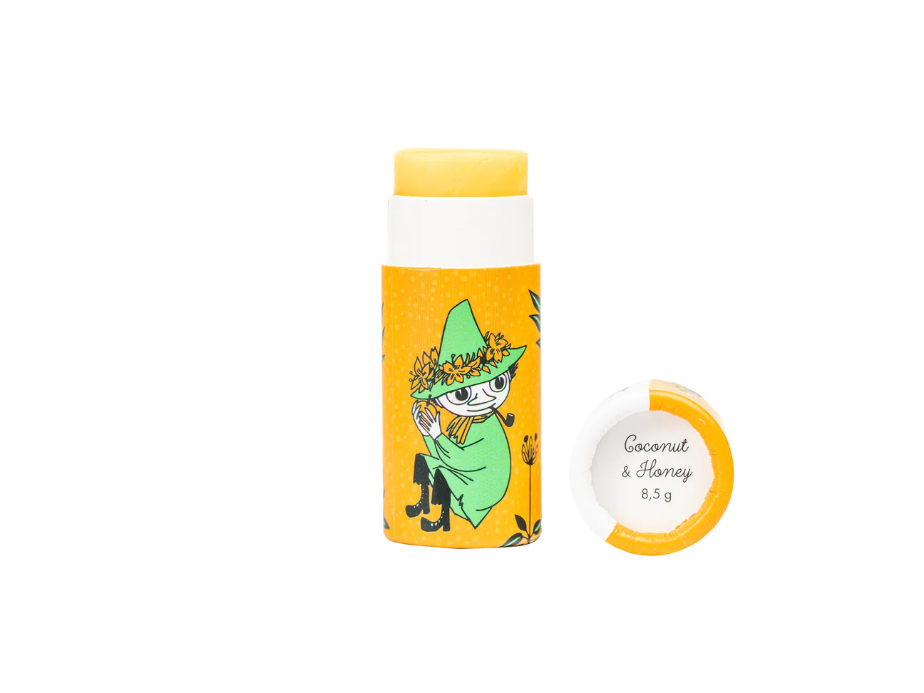 A yellow tube of Gustaf & Linnea Moomin Lipbalm Snufkin with a cartoon character in green. The cap, placed beside it, says Coconut & Honey 8.5g. This eco-friendly lip balm is shown against a clean white background.
