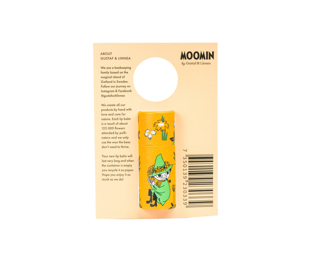The Gustaf & Linnea Moomin Lipbalm Snufkin features a yellow tube with Snufkin on beige, eco-friendly packaging that includes product details, barcode, and a circular cutout at the top.