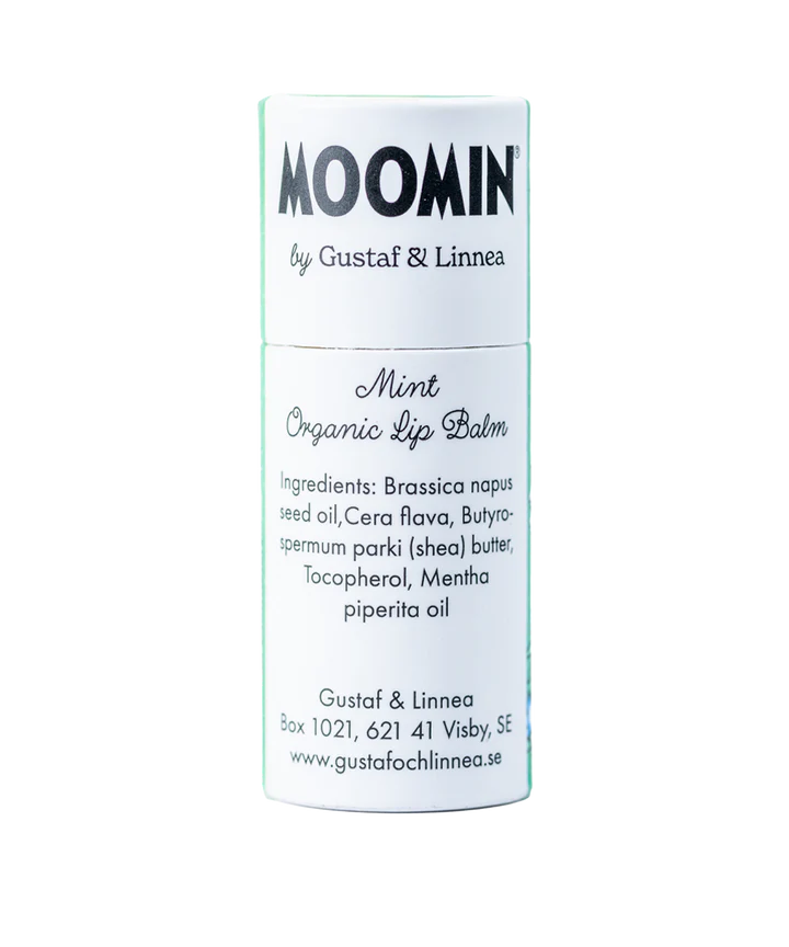 A cylindrical tube of Gustaf & Linnea Moomin Lipbalm Stinky features ingredient and contact details in green and black text on a white label. Crafted with Swedish beeswax by Gustaf & Linnea.