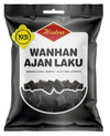 A black bag of Halva Old Time Licorice features images of licorice pieces, a yellow 1931 badge, and multilingual text, showcasing this traditional Halva brand treat.