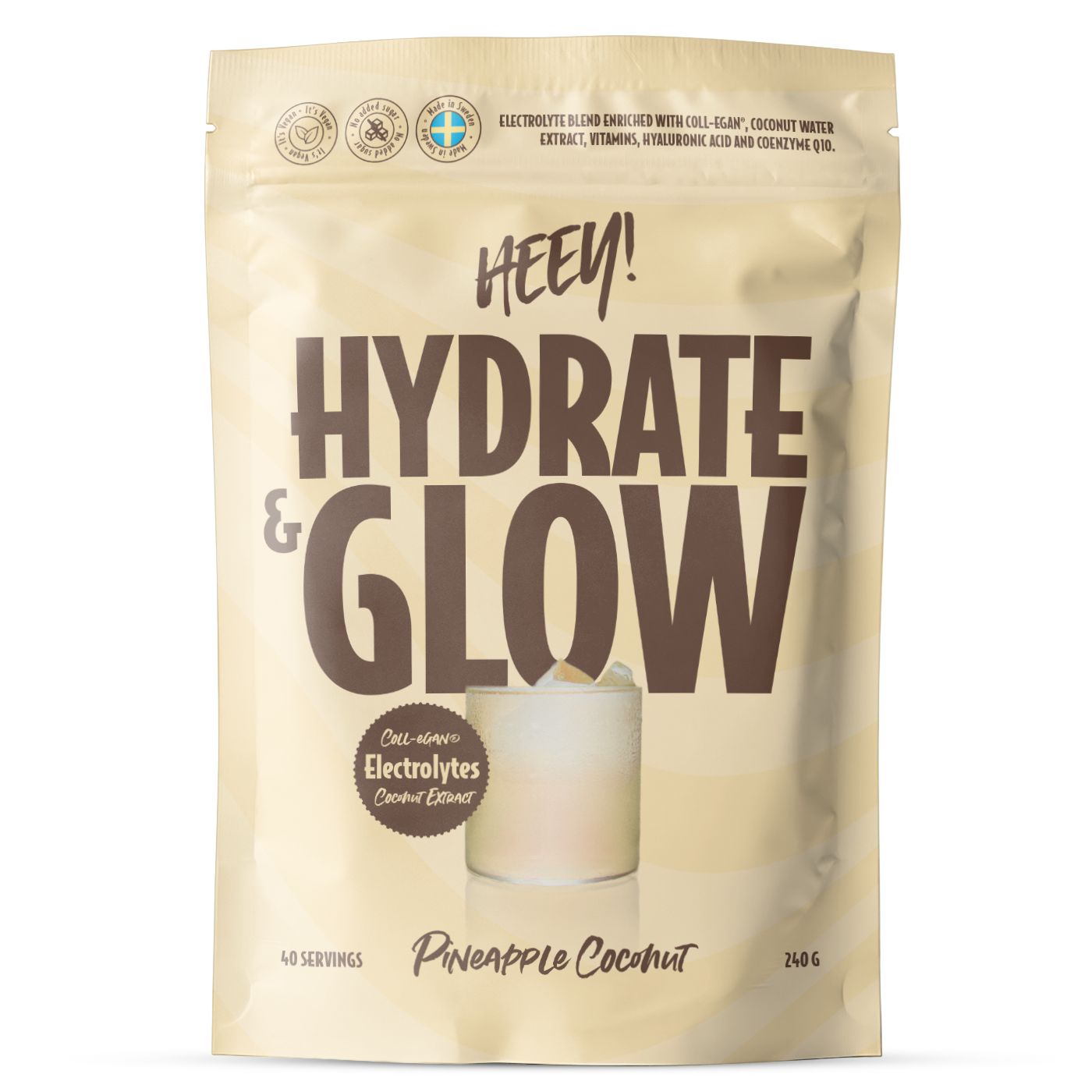 A stand-up pouch of Heey! Hydrate & Glow electrolyte drink mix in Pineapple Coconut flavor, shown against a plain white background.
