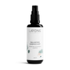 A black spray bottle of Laponie of Scandinavia Balancing Essence Mist, a hydrating face mist for sensitive skin, is shown upright against a plain white background.