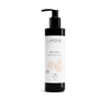 A black pump bottle of Laponie of Scandinavia Body Cream for dry, sensitive skin stands upright on a white background, featuring a white label with soft beige abstract designs.