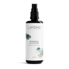 A black pump bottle of Laponie of Scandinavia Nourishing Oil Cleanser (100 ml), a gentle oil cleanser for sensitive skin, featuring minimalistic blue and beige watercolor designs on a white label.