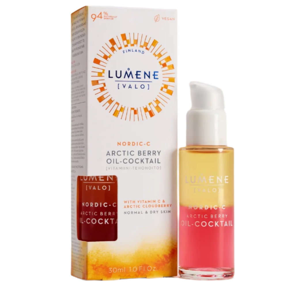 A bottle of Lumene Nordic-C Arctic Berry Oil-Cocktail, featuring a two-tone pink and yellow liquid with a white pump, sits next to its sunburst-adorned box. Enriched with Arctic cloudberry, it promotes radiant skin.