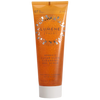 An orange tube of Lumene Nordic-C Clear Glow Cleansing Gel Scrub with white text, featuring Arctic cloudberry and vitamin C, stands upright against a plain white background.