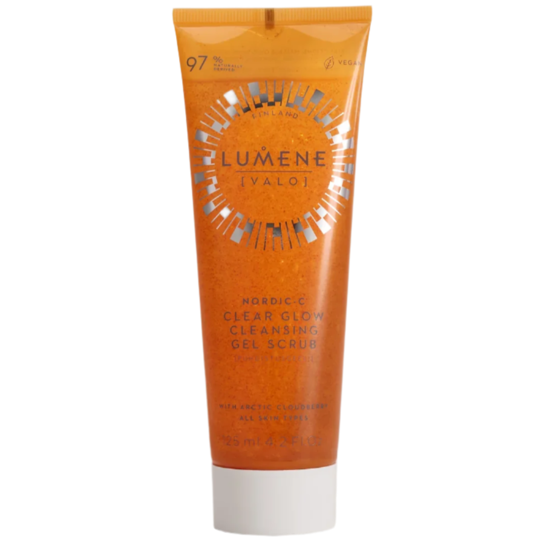 An orange tube of Lumene Nordic-C Clear Glow Cleansing Gel Scrub with white text, featuring Arctic cloudberry and vitamin C, stands upright against a plain white background.