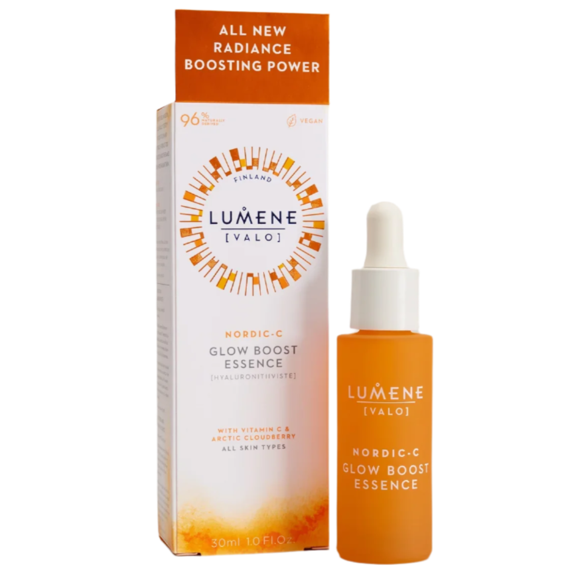 An orange dropper bottle of Lumene Nordic-C Glow Boost Essence stands next to its box, promoting a vegan vitamin C serum with hyaluronic acid and Arctic cloudberry for radiant skin.