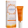 A Lumene Nordic-C Glow Boost Eye Serum in an orange tube stands beside its white and orange box, labeled vegan and featuring vitamin C and arctic cloudberry to brighten dark circles for all skin types.