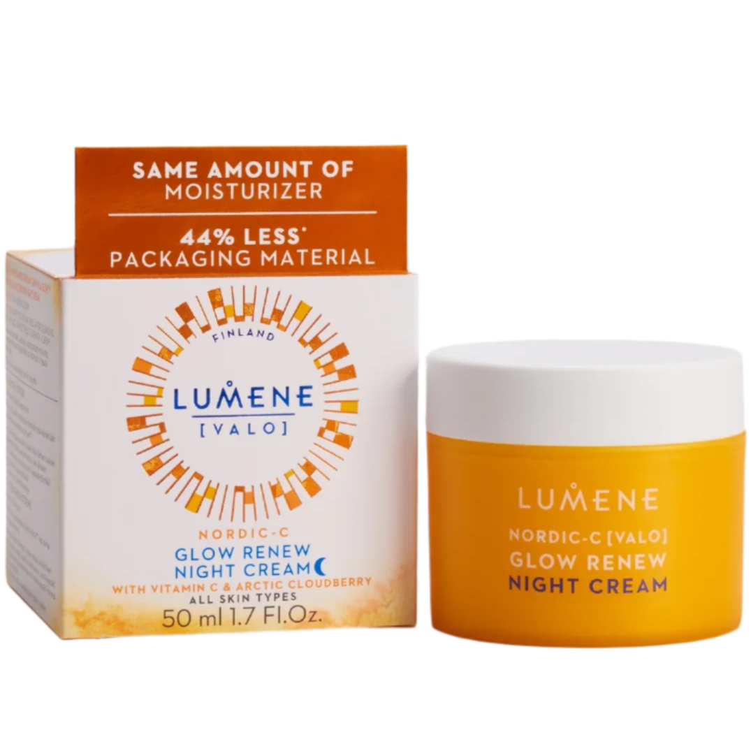A jar of Lumene Nordic-C Glow Renew Night Cream sits by its box, featuring reduced packaging. The orange and white design displays product details for radiant skin and the Lumene brand.