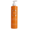 An orange pump bottle of Lumene Nordic-C Strenght & Shine Conditioner for treated or damaged hair, with silver text and accents.
