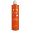 An orange bottle of Lumene Nordic-C Strength & Shine Shampoo for treated or damaged hair, featuring white text and cap. The label highlights arctic cloudberry, vitamin C, and plant-based protein.