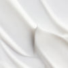 Smooth white fabric with gentle, flowing folds and soft shadows evokes the elegant, silky texture and deep hydration delivered by Lumene Nordic Hydra Hydration Recharge Overnight Cream from Lumene.