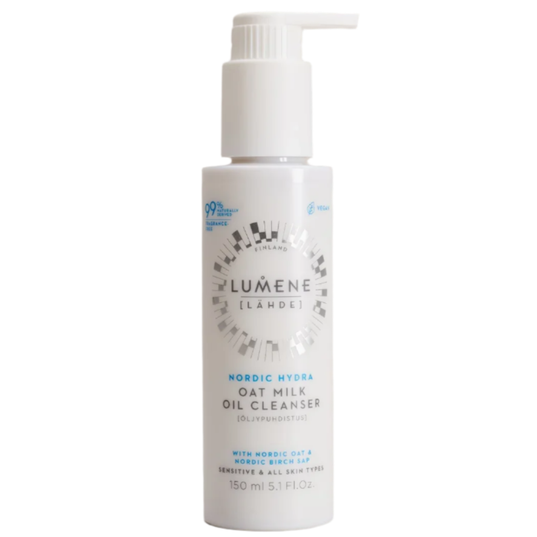 The Lumene Nordic Hydra Oat Milk Oil Cleanser comes in a white 150 ml bottle with a pump, featuring blue and silver details on the label. This gentle cleanser is ideal for sensitive skin and effectively removes makeup.