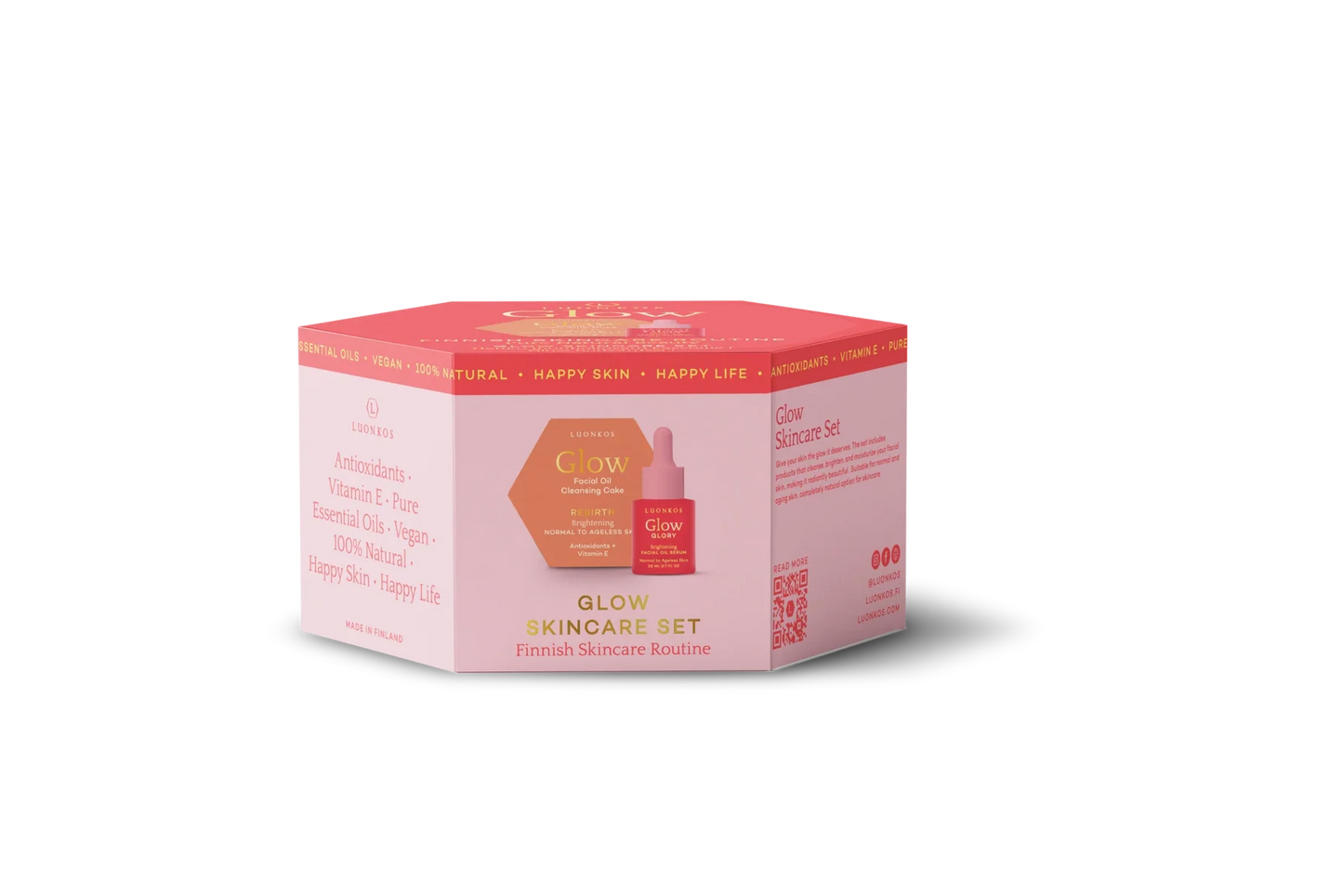 A hexagon-shaped box of Luonkos Glow & Shine Skincare Set in pink and orange, featuring product details and a serum bottle image. This Finnish vegan skincare set from Luonkos showcases the tagline "Happy Skin - Happy Life" along the top edge.