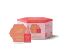 The pink and orange Luonkos Glow & Shine Skincare Set includes a dropper bottle and hexagonal soap, ideal for brightening normal to ageless skin—a perfect Finnish natural cosmetic care addition to your routine.