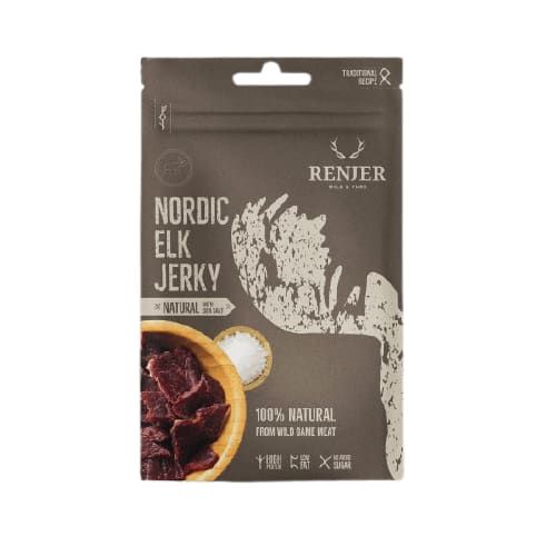 A brown Renjer package of Nordic Elk Jerky Sea Salt sits by a bowl of jerky. The packaging highlights “100% natural from wild game meat” with no added sugar.