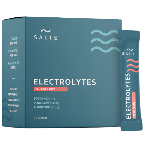 A teal box of SALTE Electrolytes Strawberry with a sachet beside it. This vegan, sugar-free hydration powder features sodium, potassium, and magnesium, has a strawberry flavor, and includes 30 sachets. Brand: SALTE.