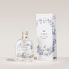 The SEES Company SEES x Moomin Room Diffuser Nordic Summer, a biodegradable diffuser in a clear glass bottle with cork, stands by a white box adorned with blue botanicals and branding—evoking a refreshing Nordic summer scent.