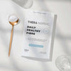 Thera Nordic Daily Healthy Fibre package with a spoonful of powder and glasses on a light background