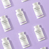 Several white bottles labeled THERA Nordic Optimized Enzymes are arranged diagonally on a light purple background, emphasizing the brand’s digestive enzyme formula for bloating relief in a repeating pattern.