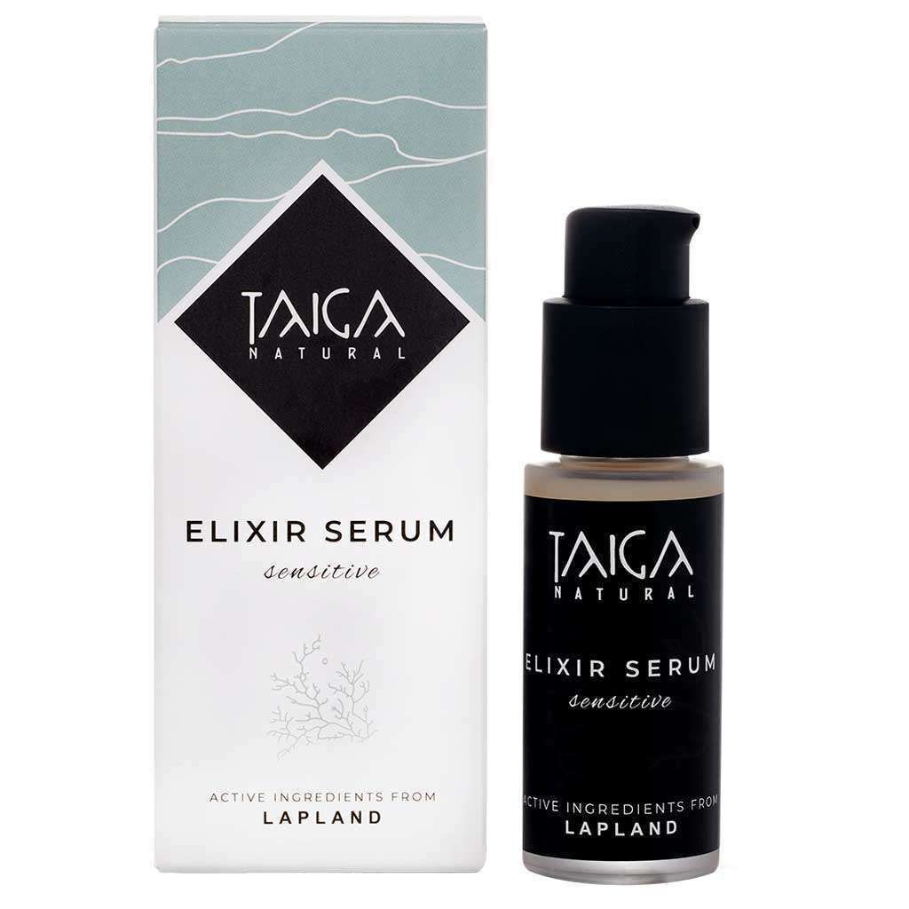 A bottle and box of Taiga Cosmetics Elixir Serum Sensitive, featuring minimalist black, white, and pale green packaging with text highlighting Lapland-sourced natural ingredients in this multi-action serum from Taiga Cosmetics.
