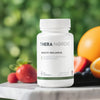 Thera Nordic supplement bottle with fruits on a blurred green background