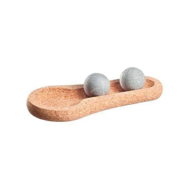 The Hukka Solejoy by Hukka features a cork base tray holding two round gray massage balls side by side in a recessed area, displayed on a white background.