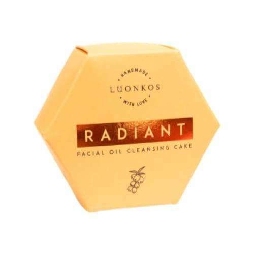 Hexagonal orange box labeled Luonkos Radiant Oil Cleansing Cake by Luonkos, a natural facial cleanser with a small berry graphic at the bottom.